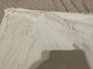 Lenzuola ricamate a mano bianche