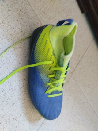 Zapatos de fútbol Kipsta azul y verde