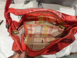Bolso naranja y rojo de piel