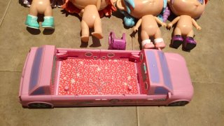 Trotties Muñecas y Coche Rosa