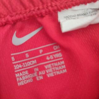 Pantalón deportivo Nike rojo y blanco