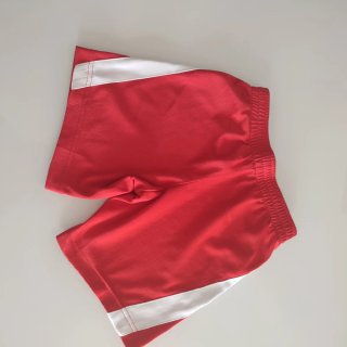 Pantalón deportivo Nike rojo y blanco