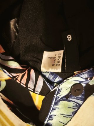 Mono corto estampado tropical.