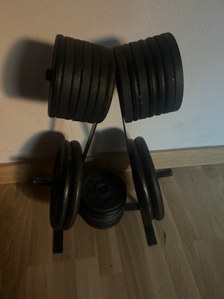 Gimnasio casero: jaula, barra, mancuernas...