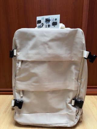 Mochila beige viaje avion