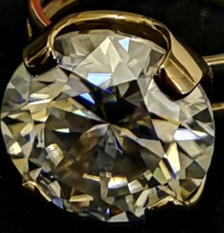 Anillo de Oro 18k con Brillante de 12 Quilates