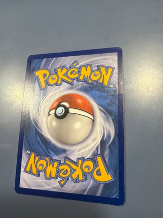 Carta Pokémon Reshiram y Charizard GX Promo