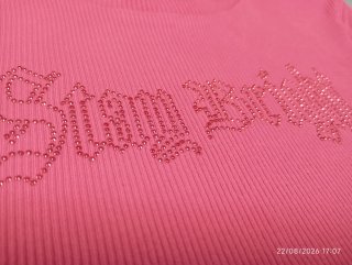 Top niña H&M rosa letras brillantes 14 años