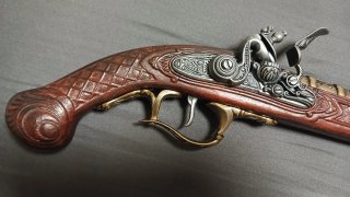 Pistola de chispa decorativa réplica antigua
