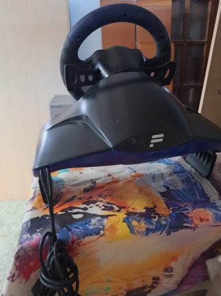 PlayStation 2 (PS2) con mandos y volante