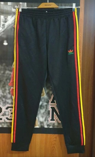 Tuta Adidas nera con strisce rasta sst jamaica