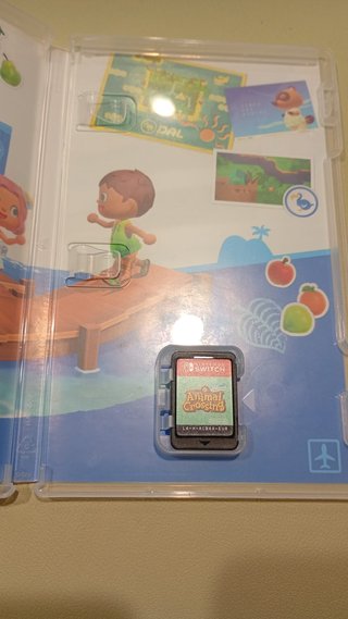 Nintendo Switch Lite Amarilla + Animal Crossing