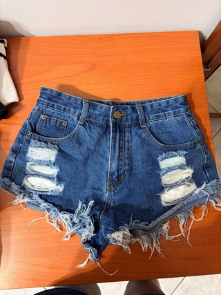 Pantaloncini jeans strappati donna