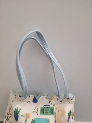 Bolso de mano con estampado floral
