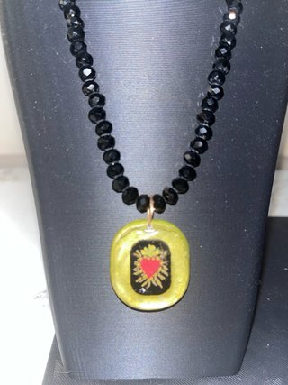 Collana con ciondolo cuore sacro