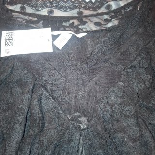 Top encaje negro con volantes talla M