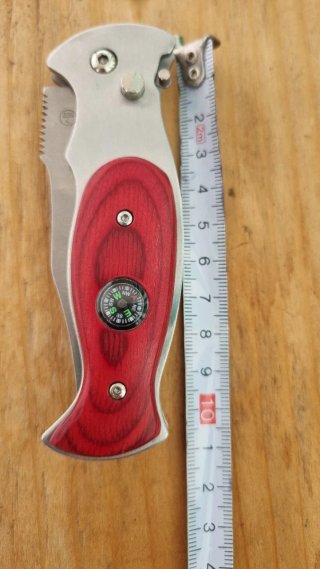 Coltello a scatto da collezione con bussola
