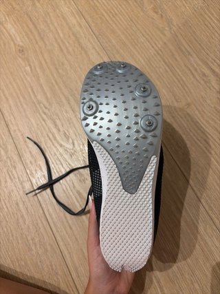 Clavos de atletismo negros