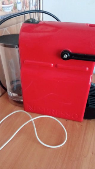 Macchina da caffè Nespresso rossa