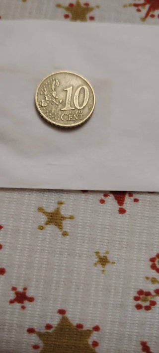 Moneda 10 céntimos Euro - Error de metal
