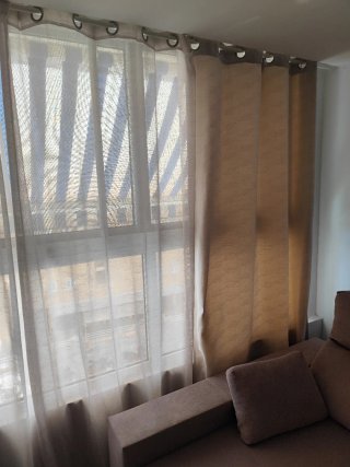 Cortinas beige, mint y transparentes de tela