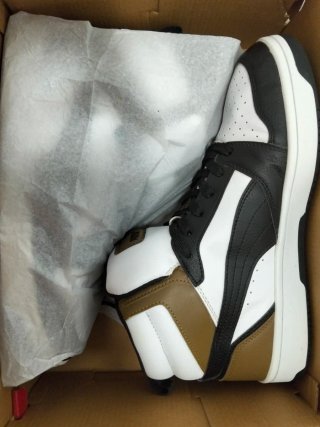 Zapatillas Puma Rebound Joy Negras y Blancas