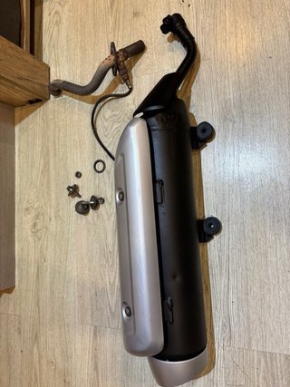 Escape Suzuki Burgman 125 inyección
