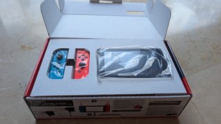Nintendo Switch en caja original + sus accesorios