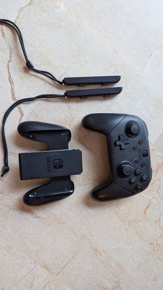 Nintendo Switch en caja original + sus accesorios