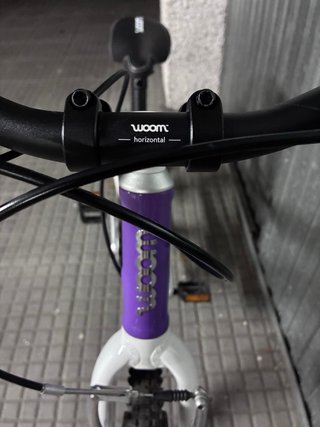 Bicicleta Woom 4 Morada. Como nueva.