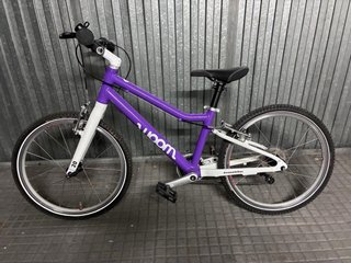 Bicicleta Woom 4 Morada. Como nueva.