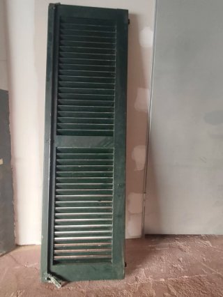 Persianas verdes de madera
