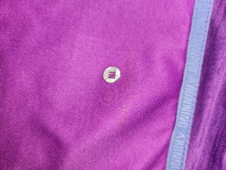 Cortavientos mujer púrpura y rosa