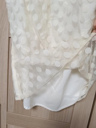 Blusa blanca con lazos