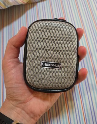 Custodia piccola con zip, camera bag