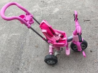 Triciclo rosa para niños