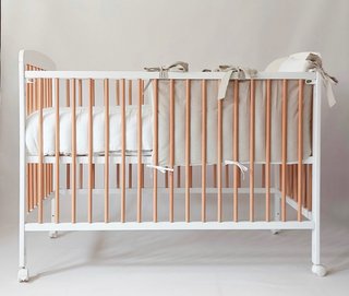 Cuna 120x60 con ruedas y baranda abatible nueva