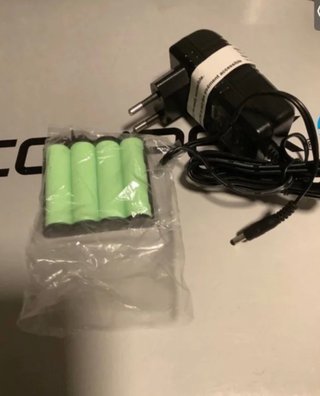COMPEX CARGADOR + BATERIA NUEVO ORIGINAL .