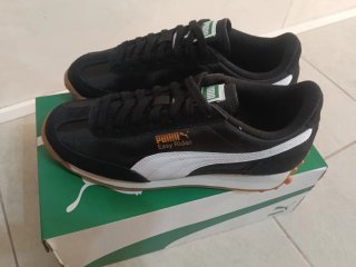 Scarpe Puma nere e bianche