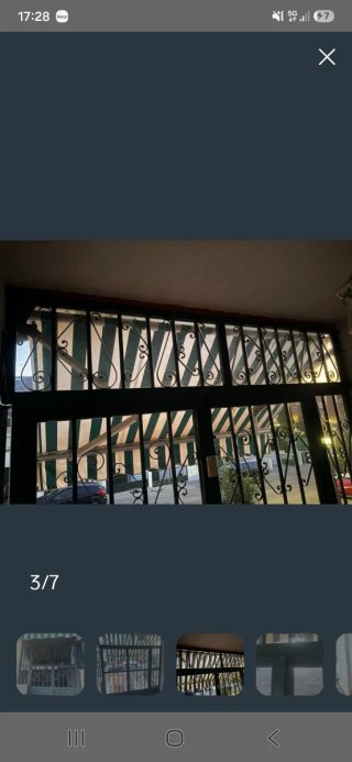 Puerta reja hierro con cristales tintados