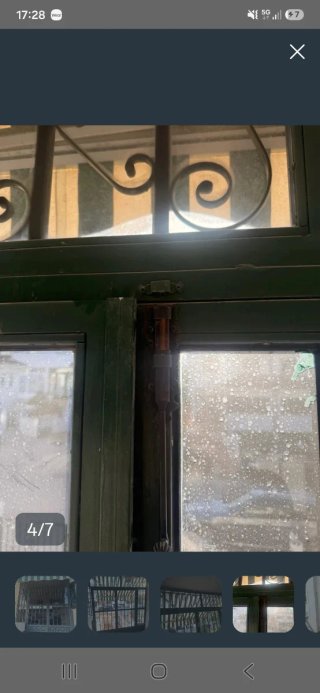 Puerta reja hierro con cristales tintados