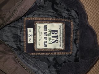 Chaquetón gris con cinturón