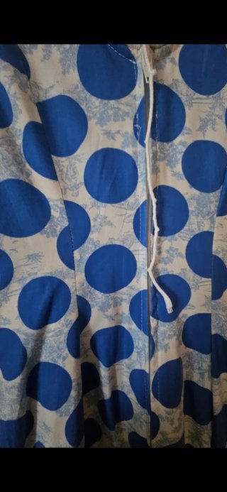 Traje de flamenca azul con lunares blancos