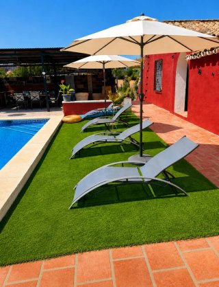La Finca Roja Es un bonito apartamento con piscina