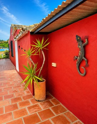 La Finca Roja Es un bonito apartamento con piscina