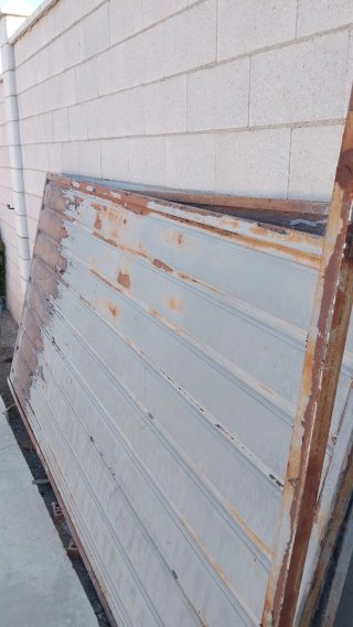 Puertas dobles para naves o garaje