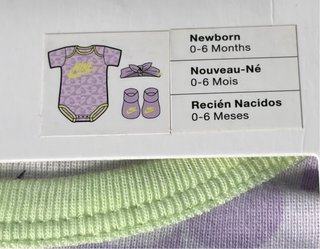 Conjunto Nike bebé niña body, patucos y diadema