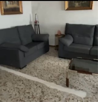 Sofá de tela gris