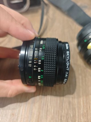 Canon AE-1 Program + objetivo + accesorios