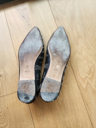 Zapatos planos negros tachas Carolina Herrera